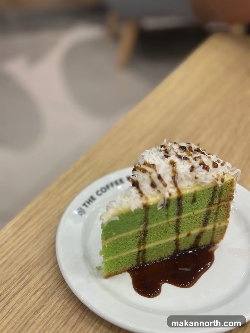 Slice of Green Cake with Toppings