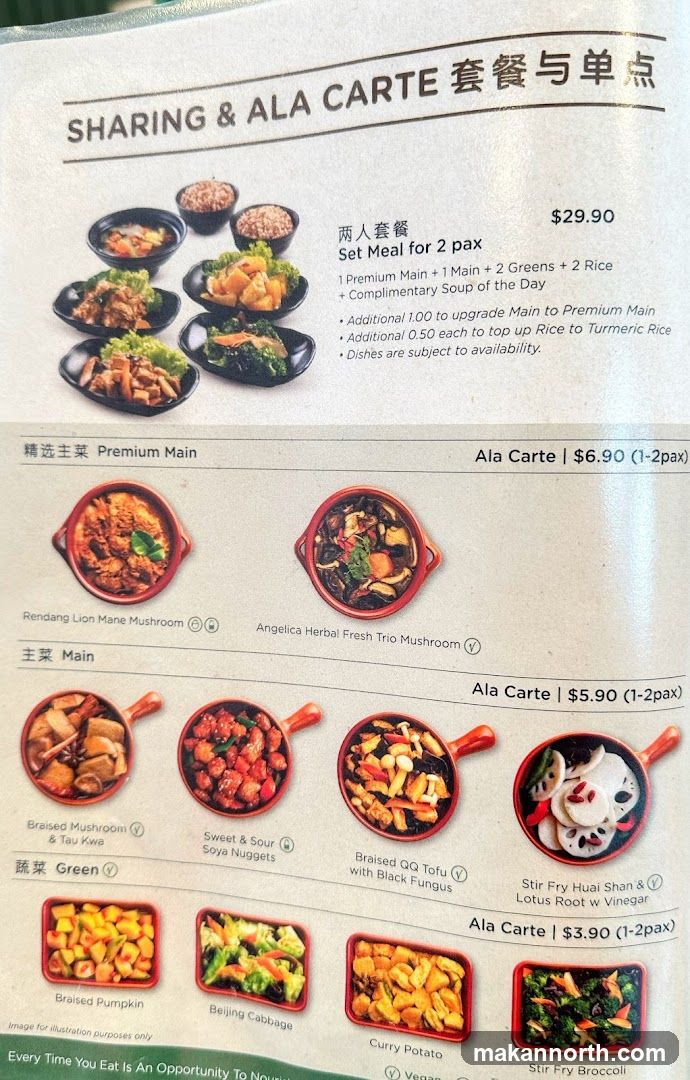 Menu featuring set meals and a la carte options with various vegetarian dishes.