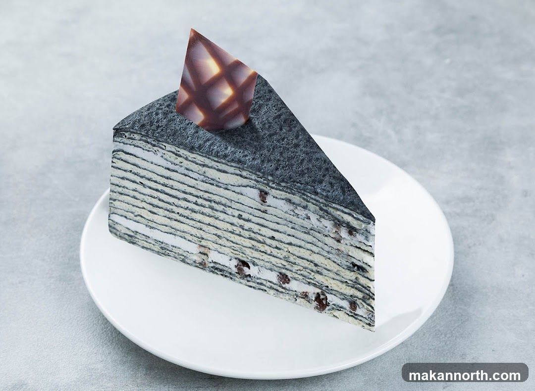 Slice of Black Sesame Mille Crepe Cake