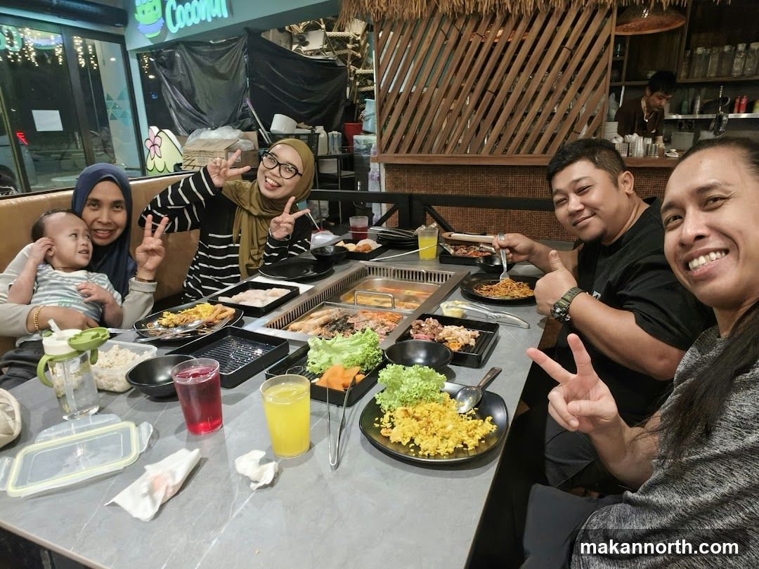 Group enjoying a meal at a restaurant