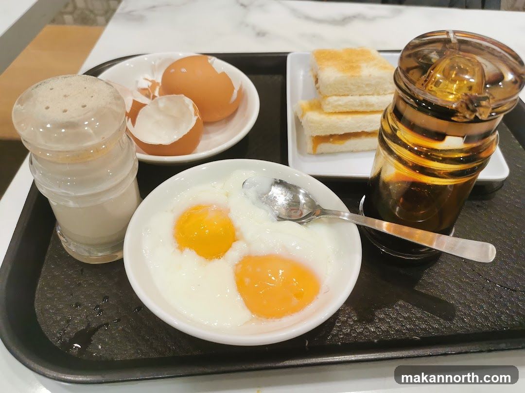 Soft-boiled eggs with toast and coffee