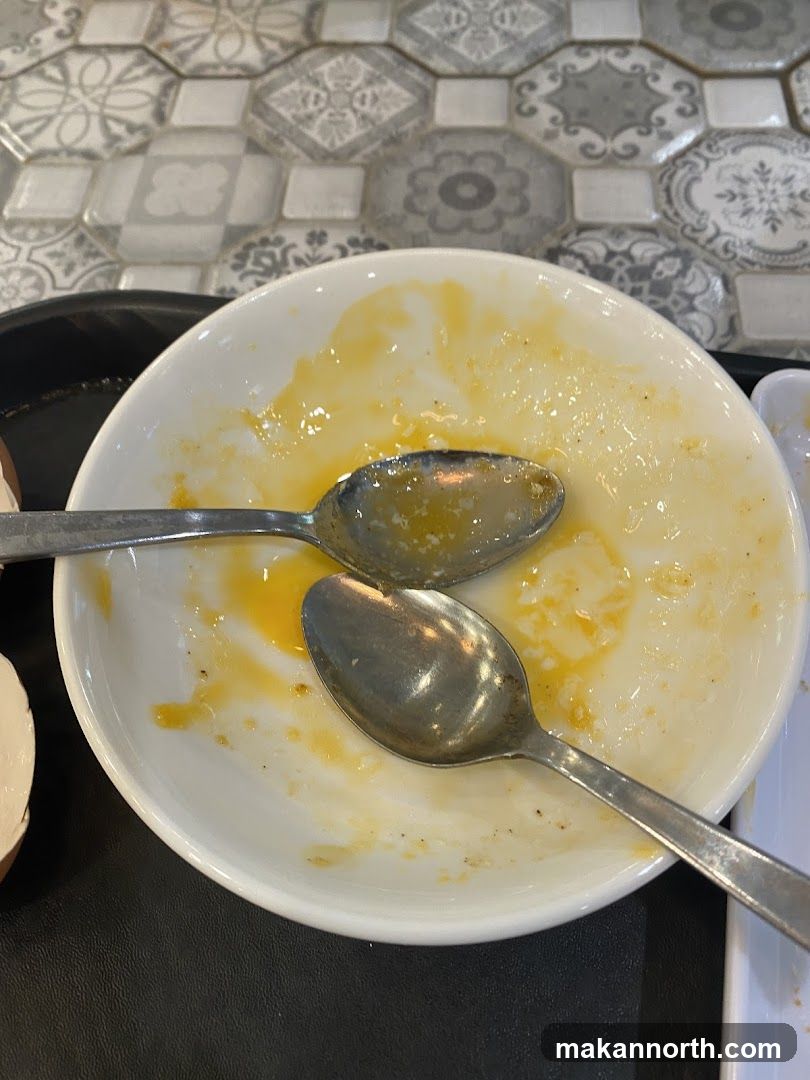 Dirty Bowl with Spoons