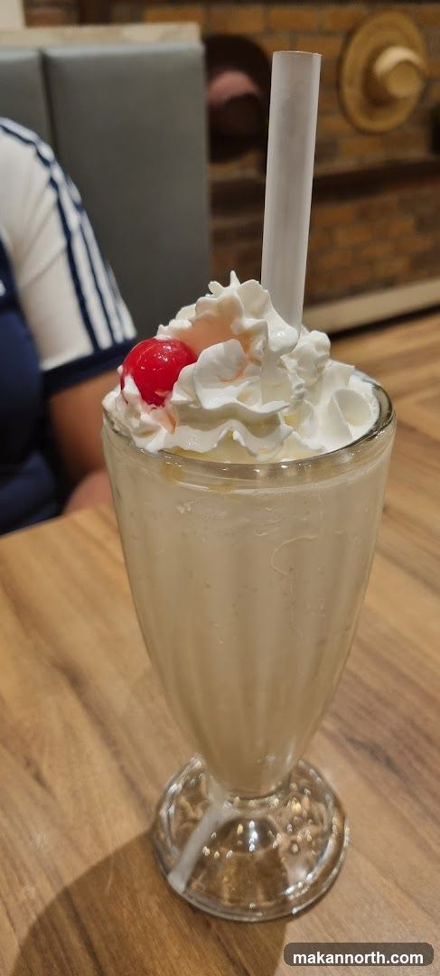 Milkshake with Whipped Cream and Cherry