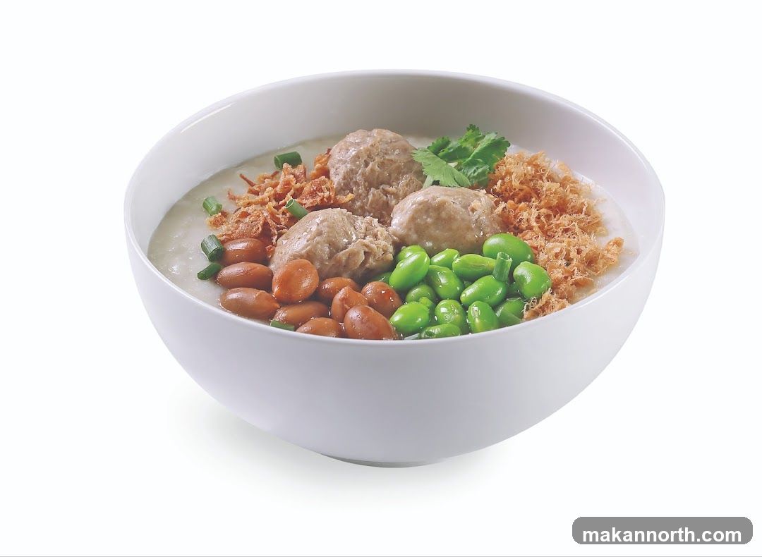 Bowl of Congee with Meatballs and Edamame