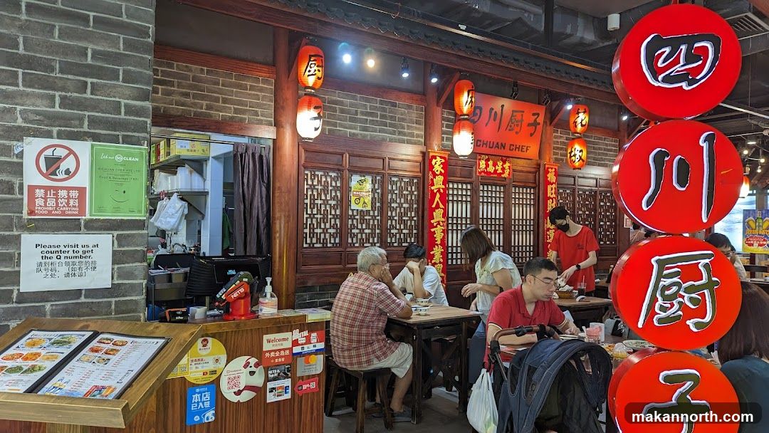 Restaurant Interior with Diners and Signage