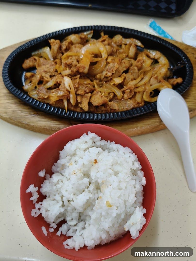 Sizzling Pork and Onions with Rice