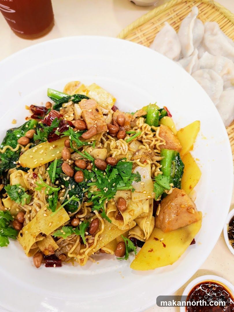 Spicy Noodle Dish with Dumplings