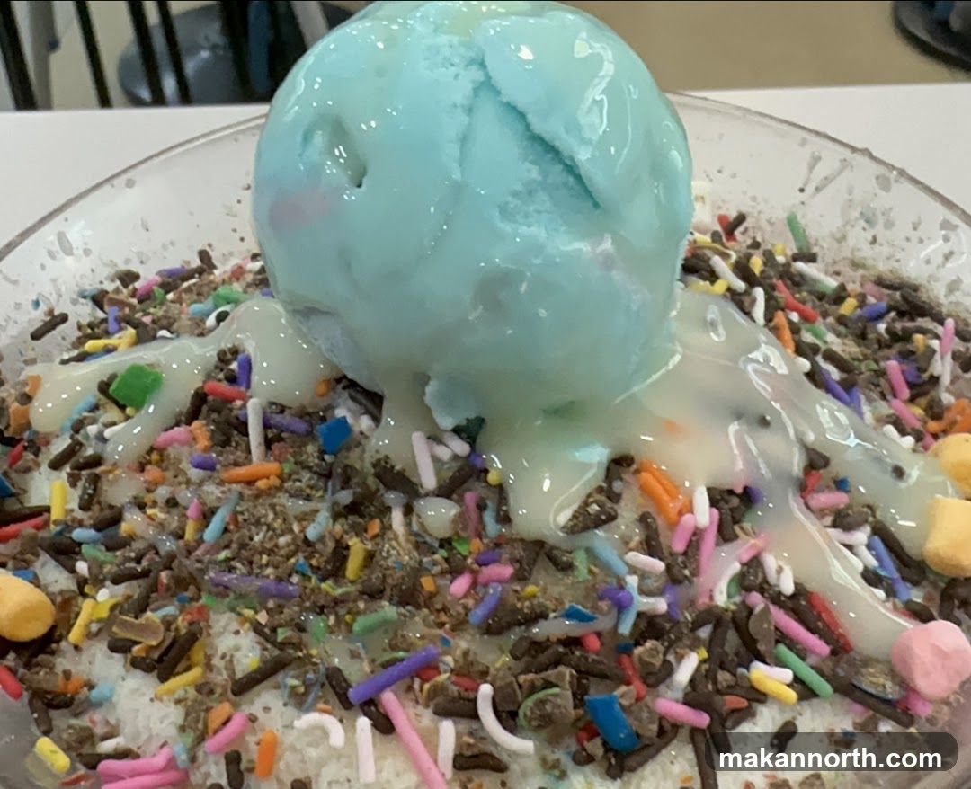 Shaved Ice Dessert with Ice Cream and Sprinkles