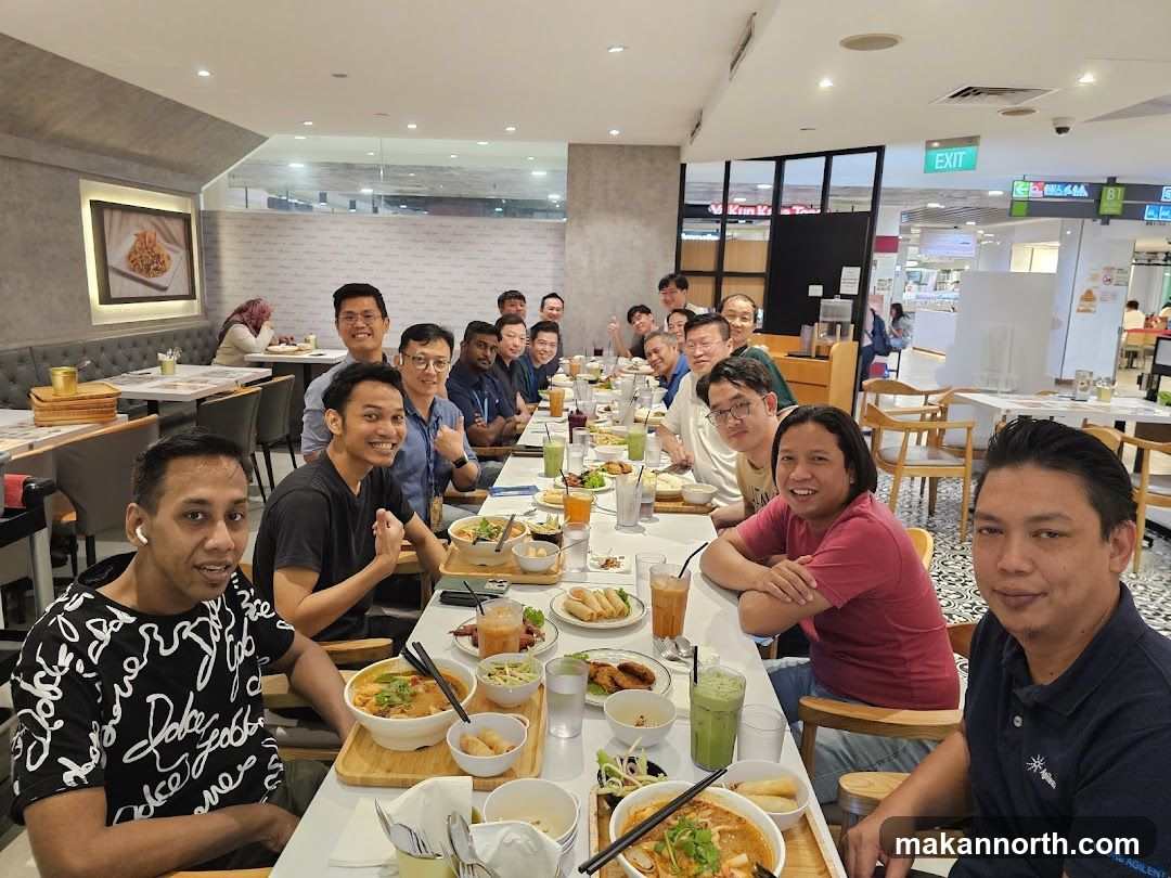 Group enjoying a meal at a restaurant