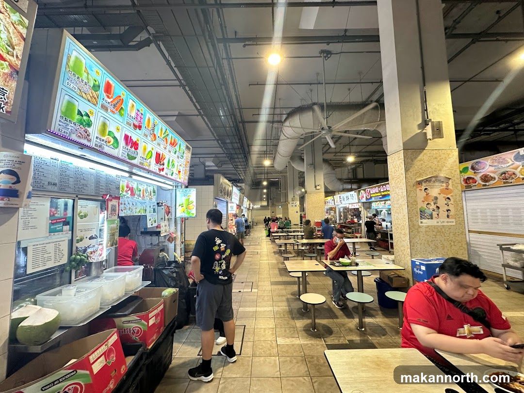 Food court with various stalls and seating