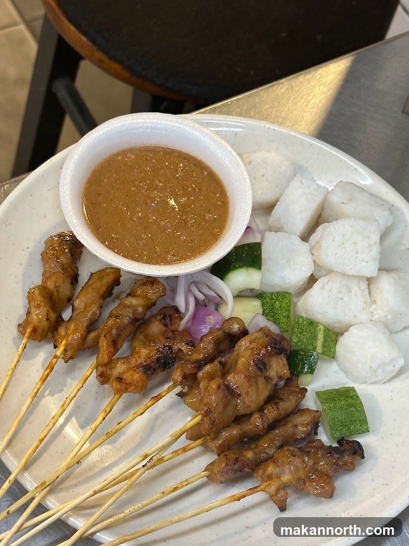 Chicken Satay with Peanut Sauce and Rice Cakes