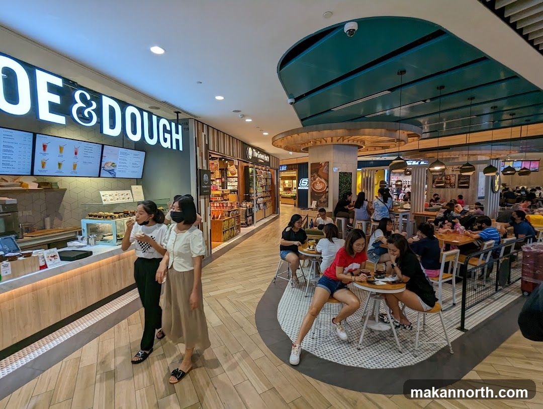 Interior of a busy cafe with customers