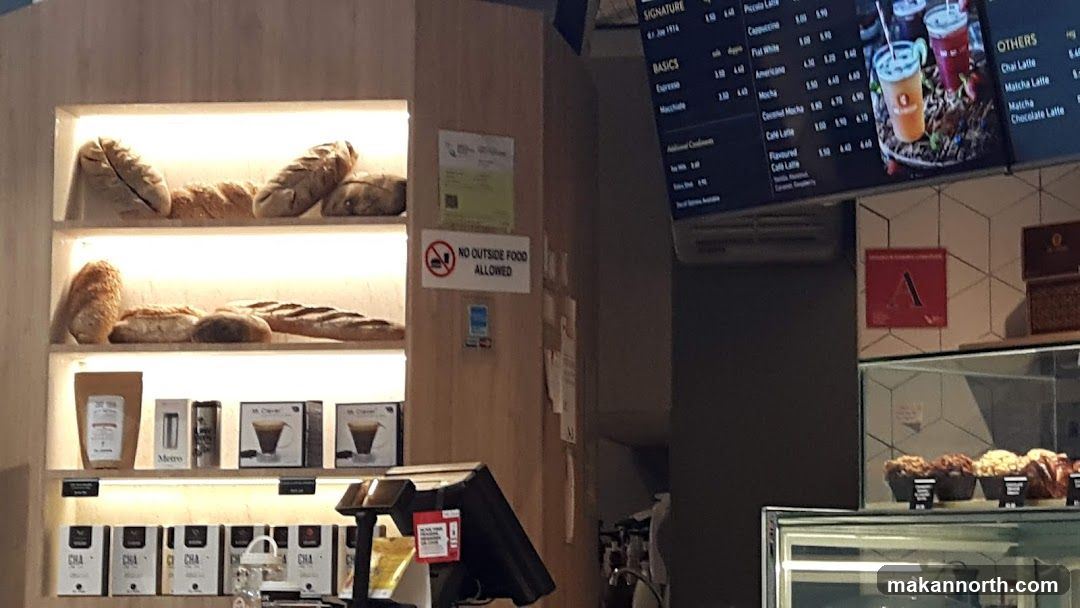 Cafe Interior with Baked Goods and Menu