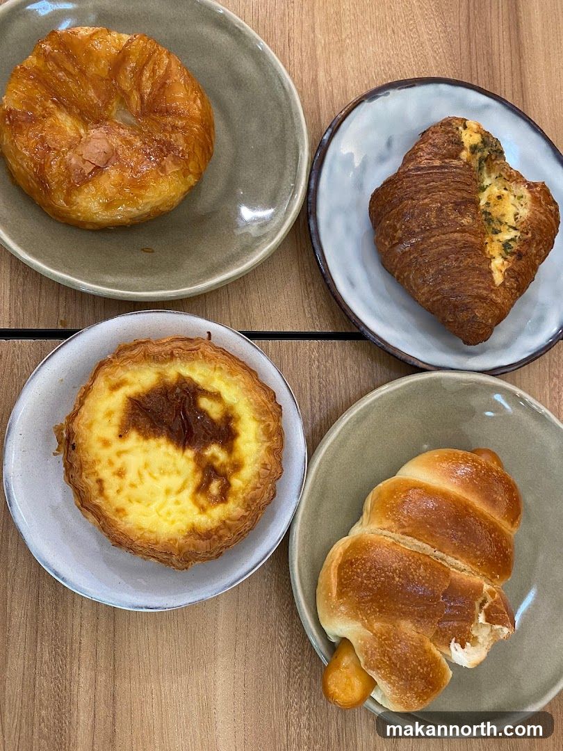 Four Pastries on Plates
