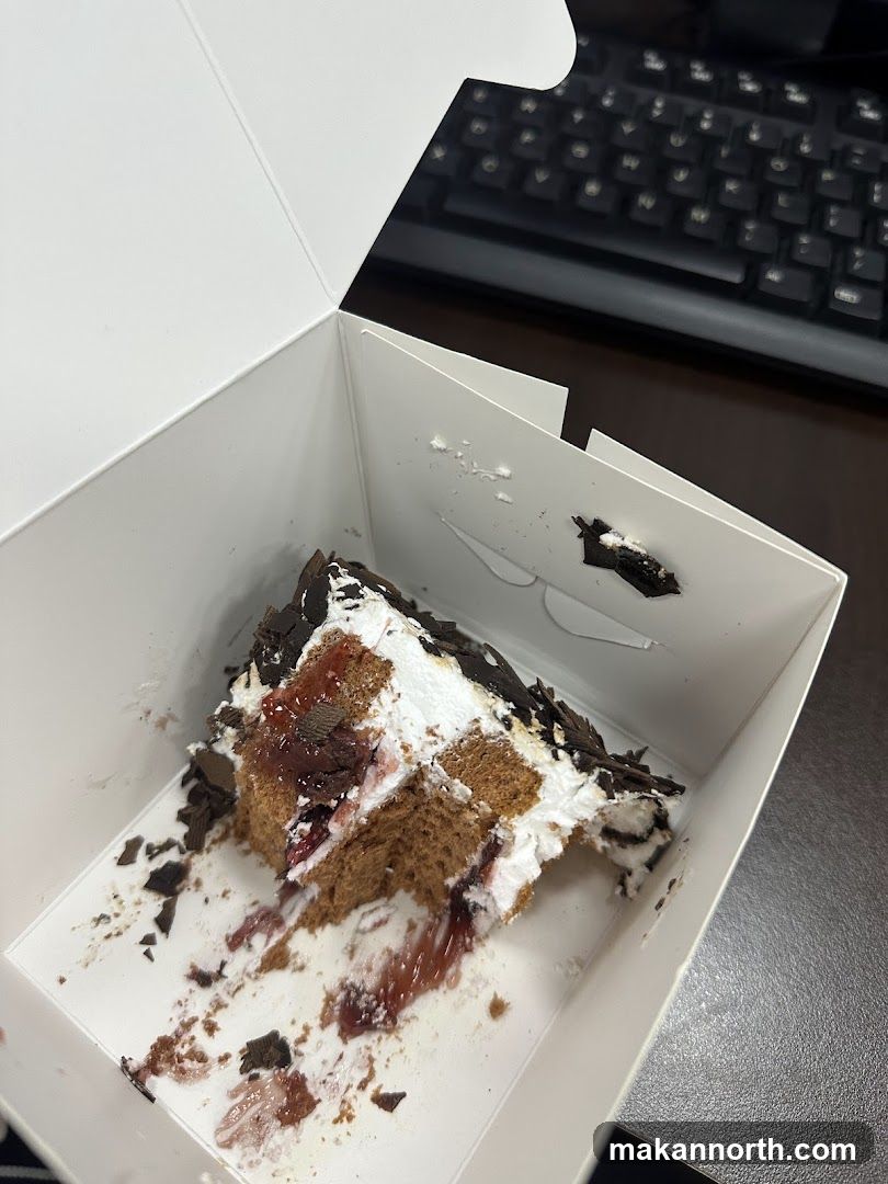 Partially Eaten Cake in Box