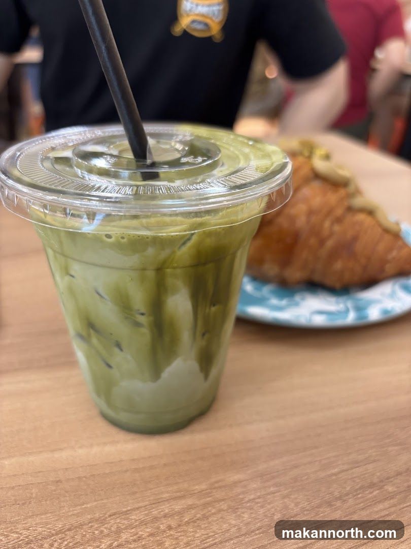 Iced Matcha Latte and Croissant