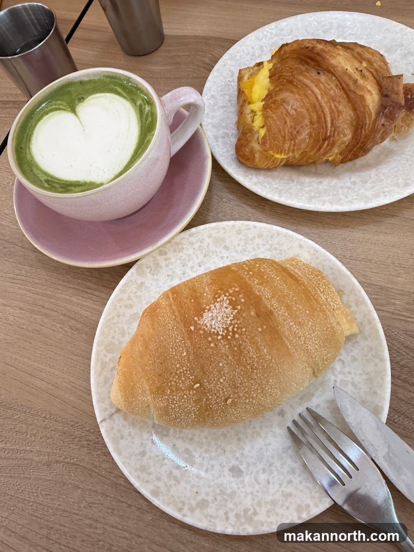 Matcha latte and croissants