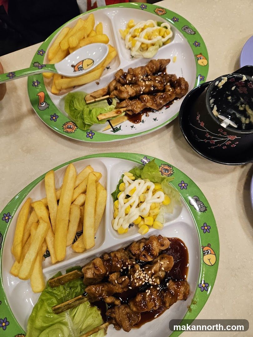 Chicken Skewers with Fries and Corn Salad