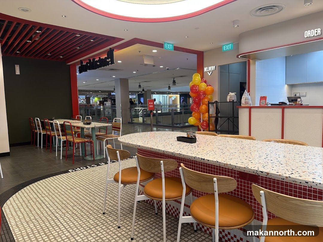 Restaurant Interior with Seating and Order Counter