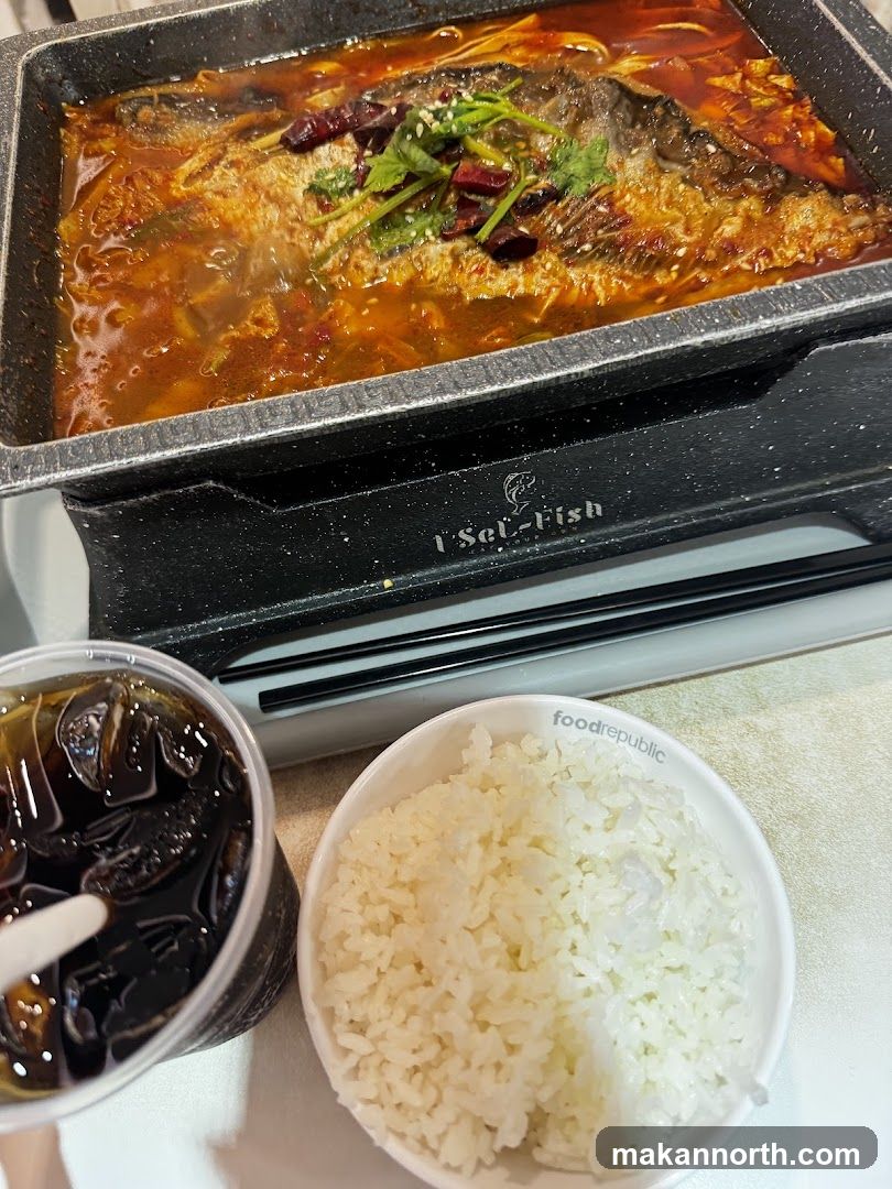 Spicy Fish Dish with Rice and Drink
