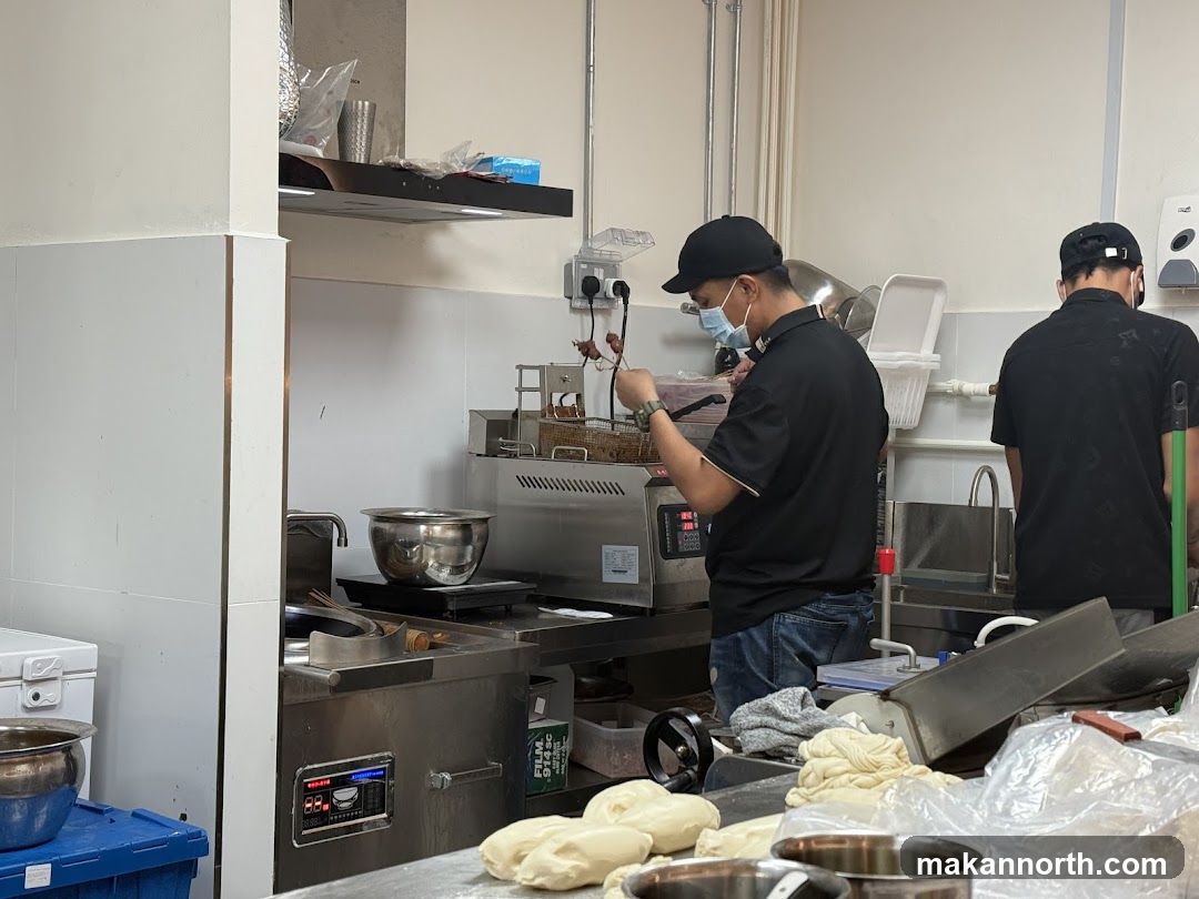 Kitchen Staff Preparing Food