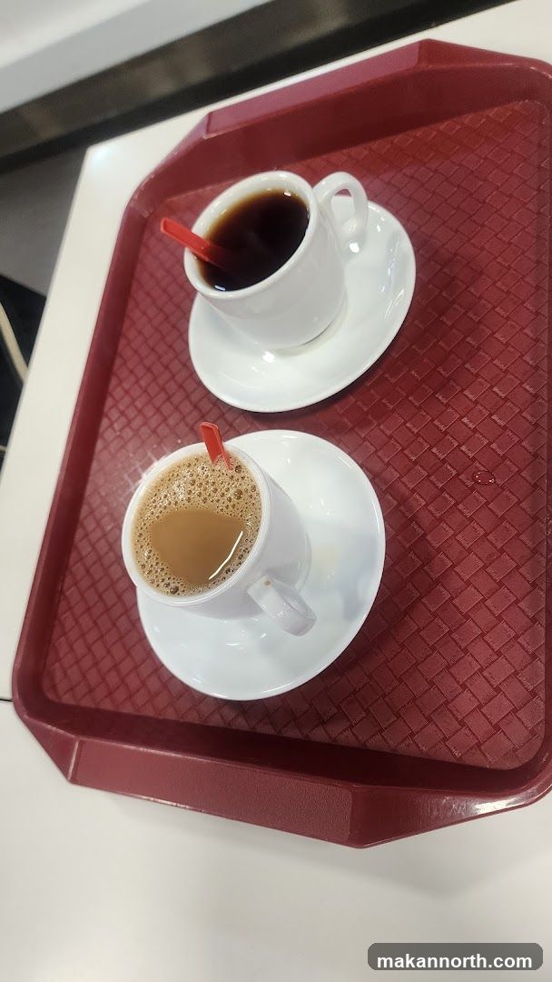 Two cups of coffee on a tray