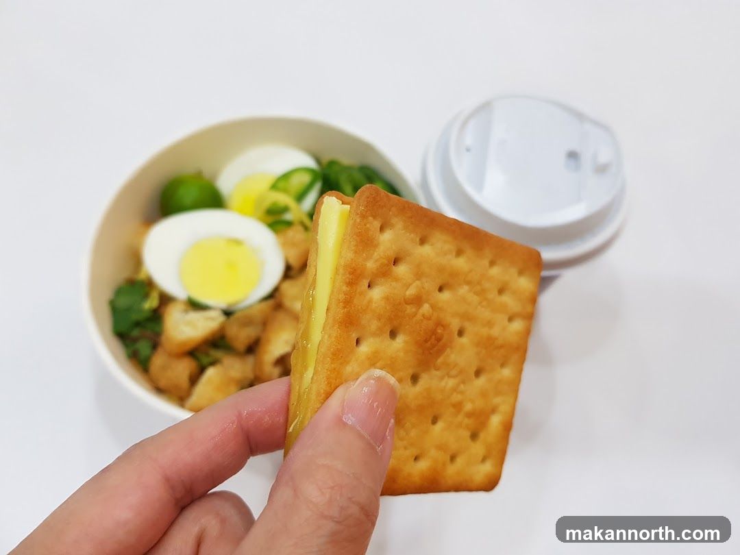 Cracker with Cheese and Bowl of Food