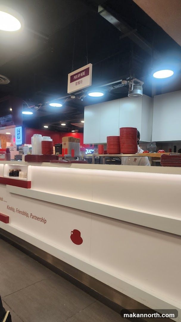 Food service counter with pickup sign