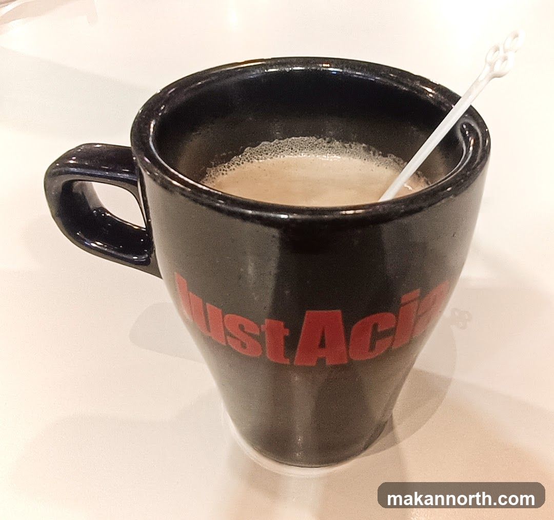 Coffee in a branded mug
