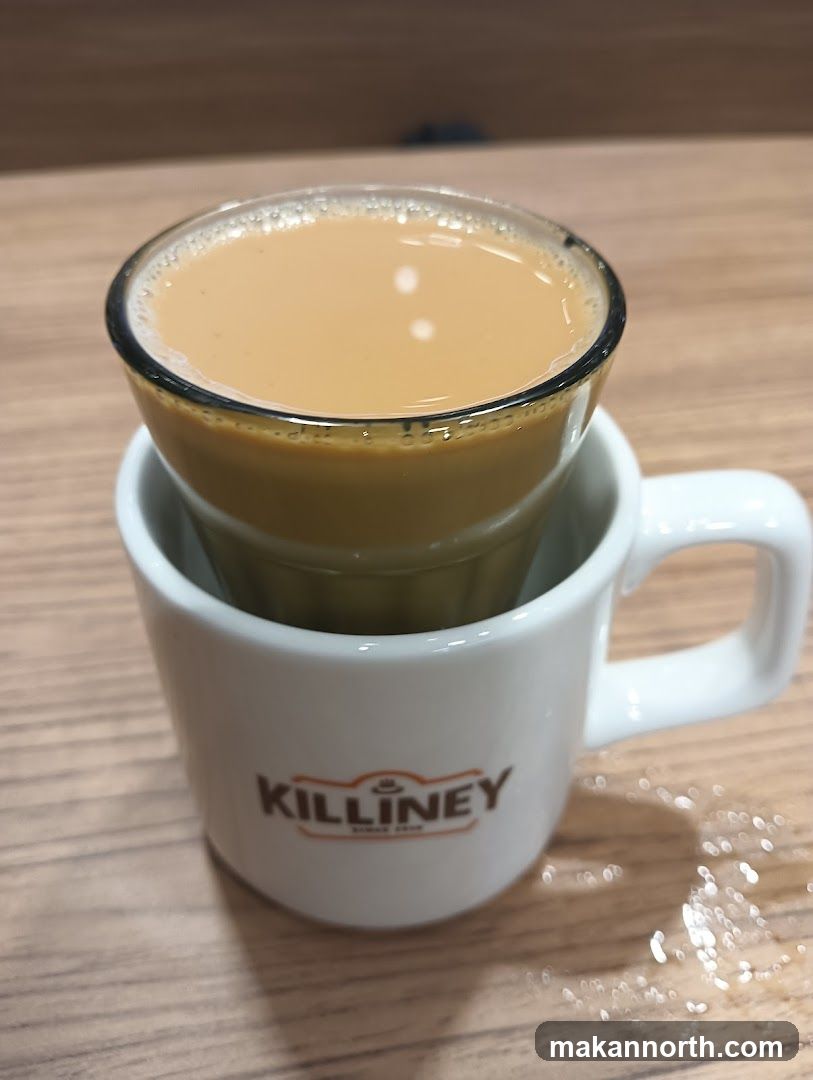 Tea in a glass cup inside a mug