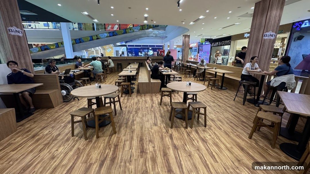 Interior of a cafe with wooden tables and chairs