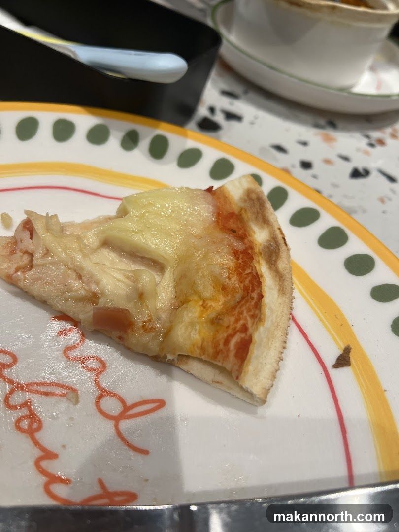 Pizza Slice on Plate