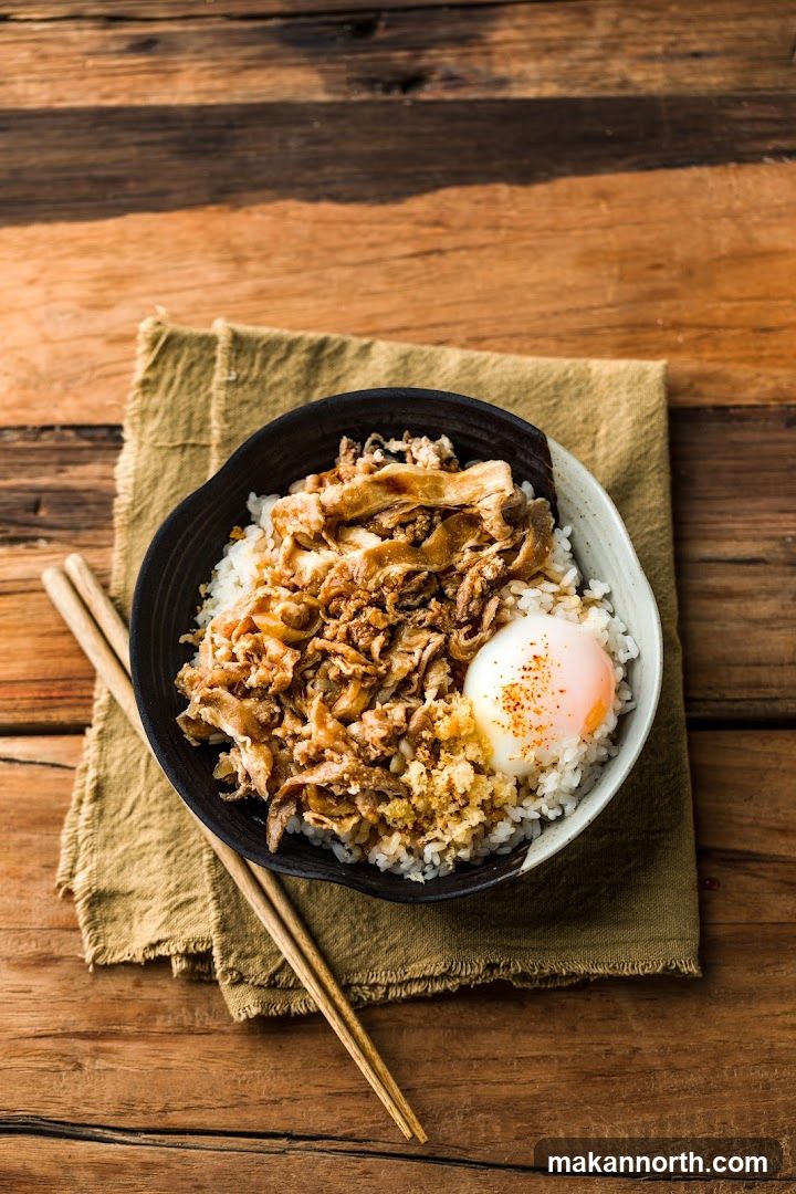 Bowl of rice with meat and egg