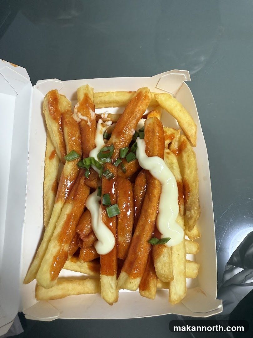 Fries with sauce and toppings