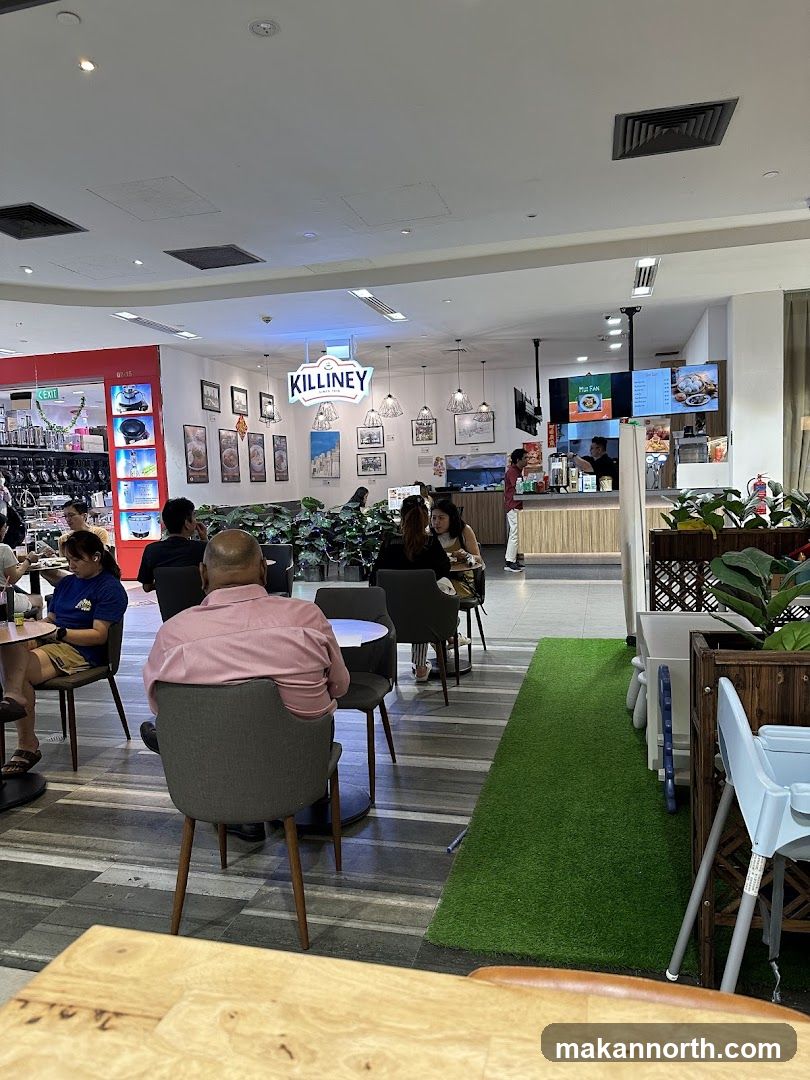 Interior of a cafe with customers