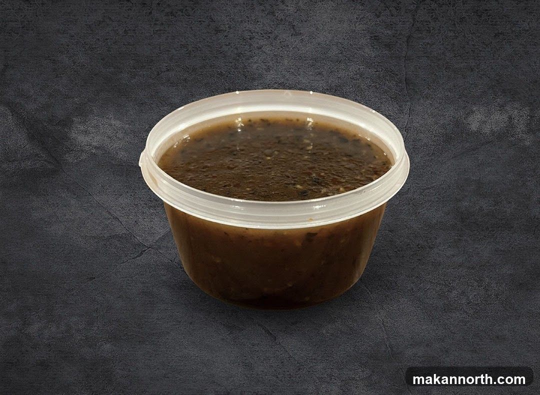 Soup in a clear plastic container