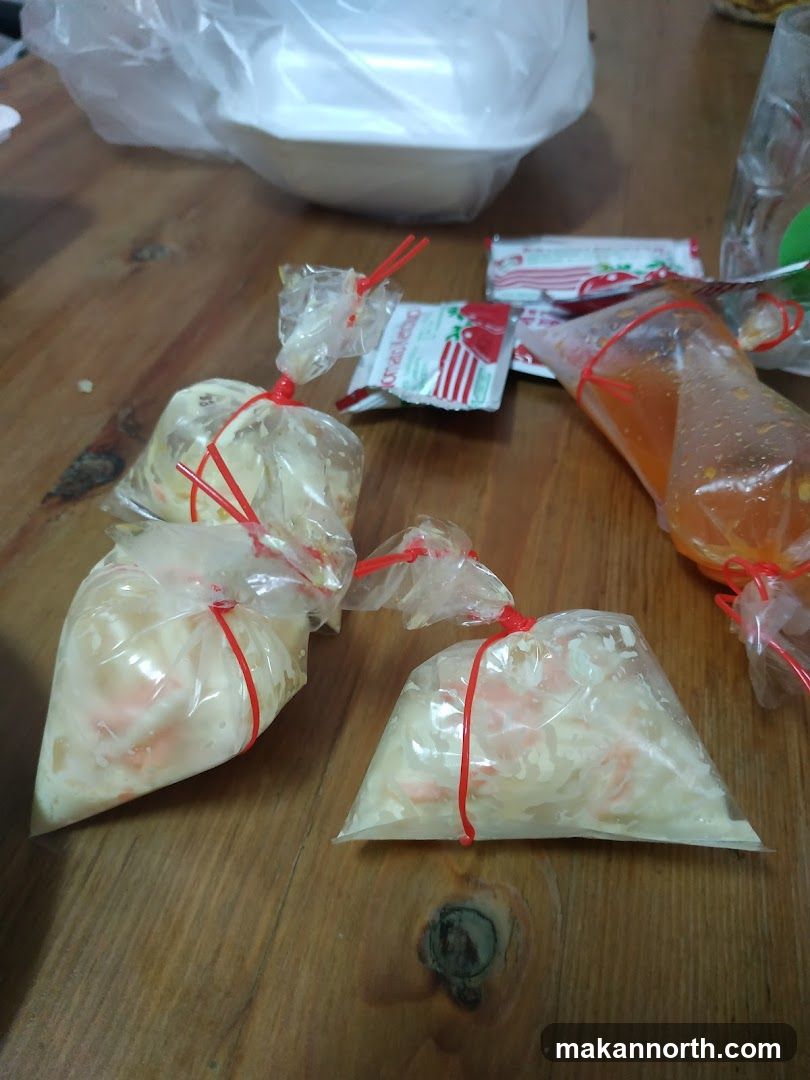 Food in plastic bags with condiments
