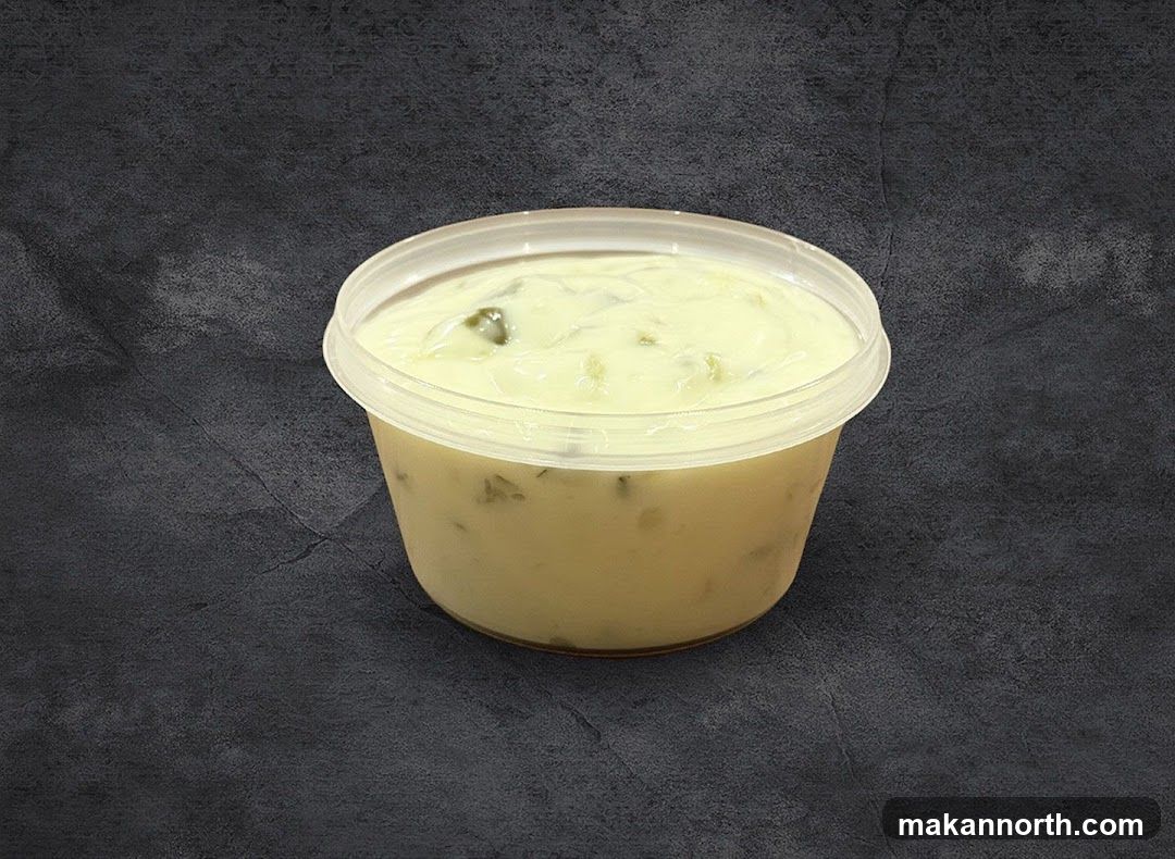 Sauce in a plastic container