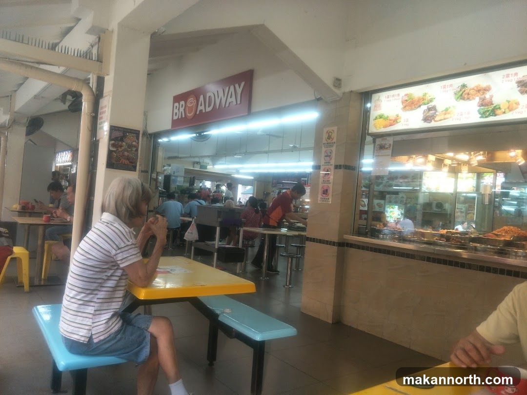 Food court with seating and food stalls