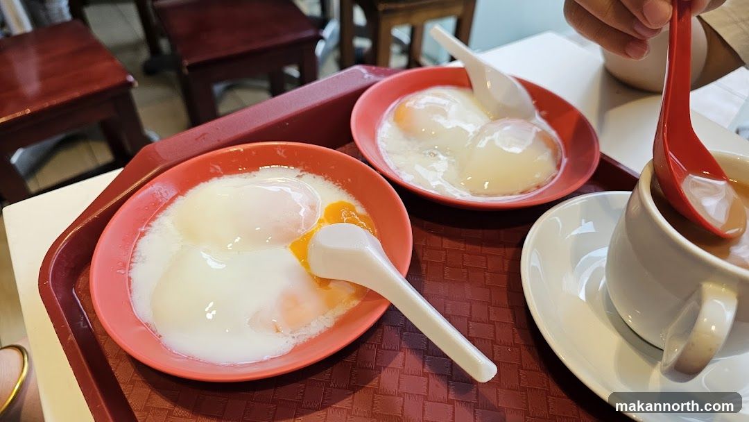 Soft-boiled eggs and coffee