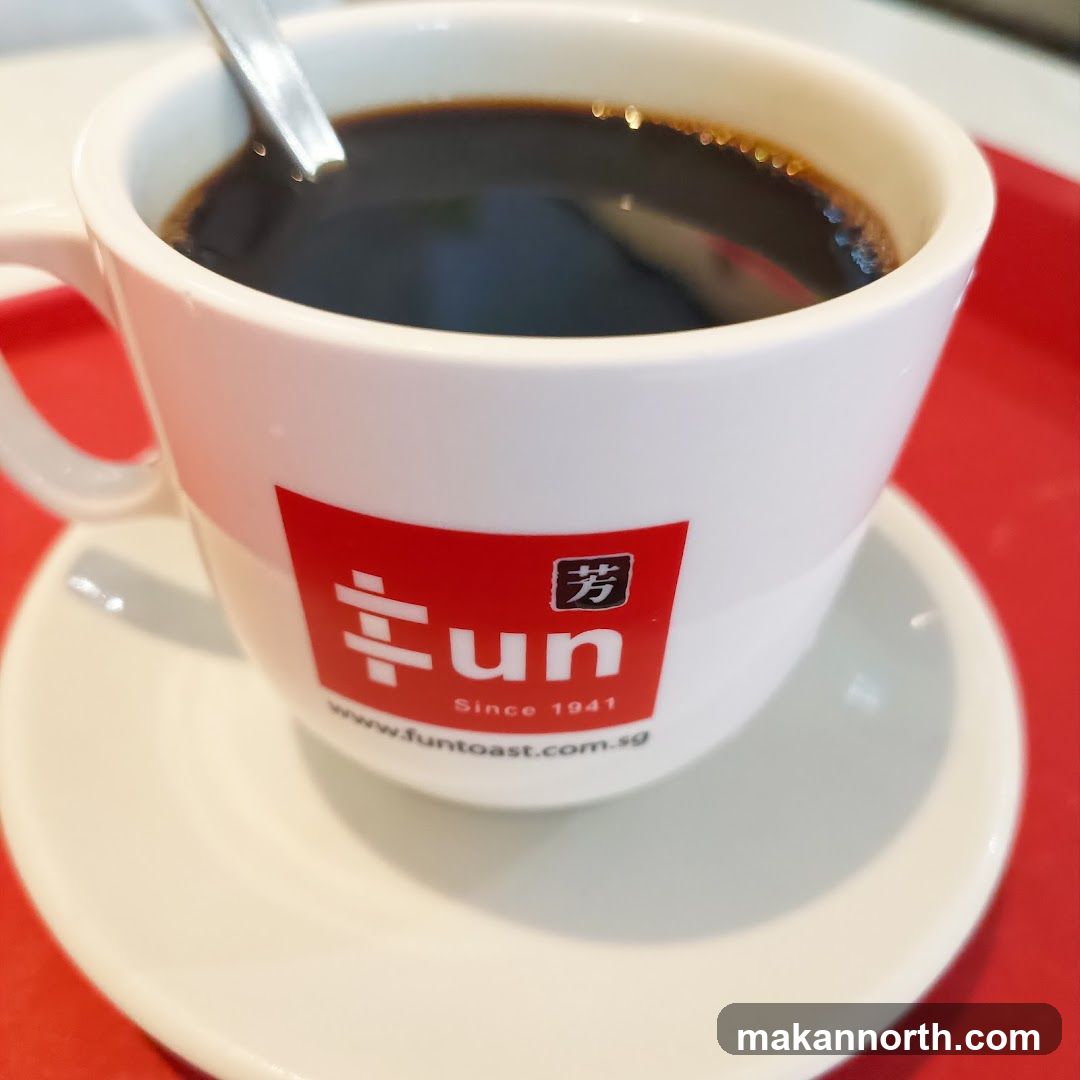 Coffee in a branded cup