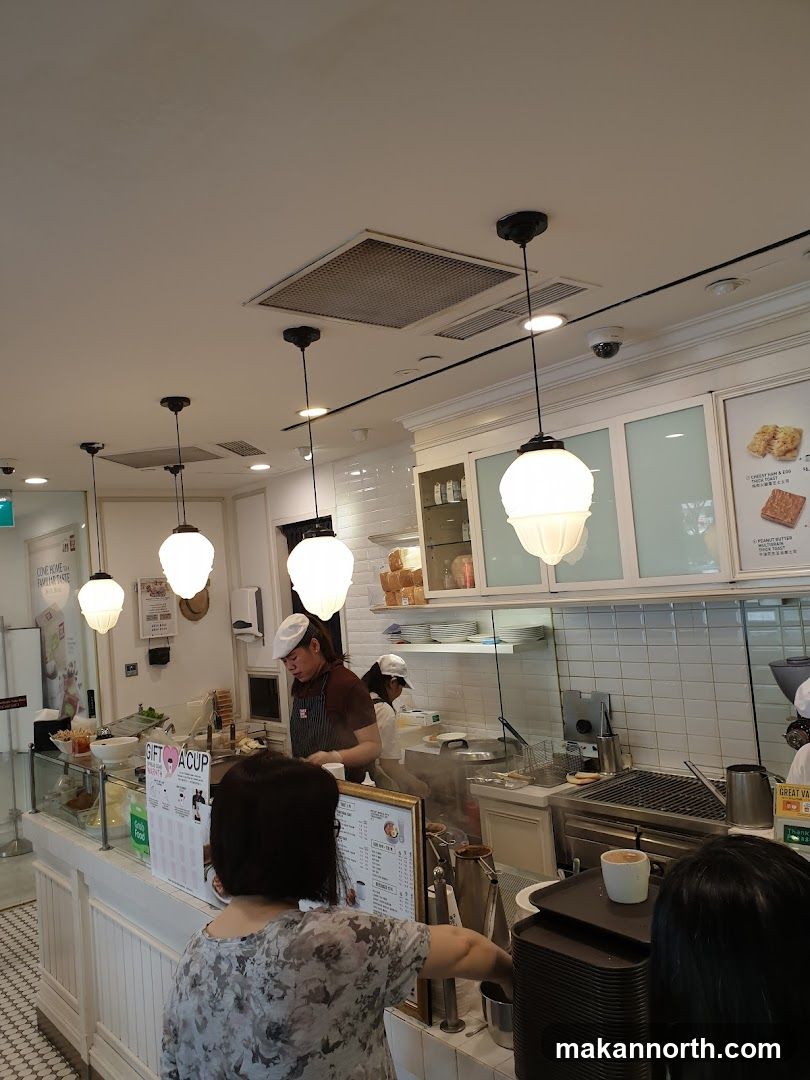 Cafe Interior with Staff Preparing Food
