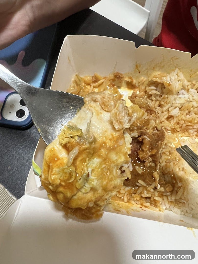 Close-up of a meal in a takeout container