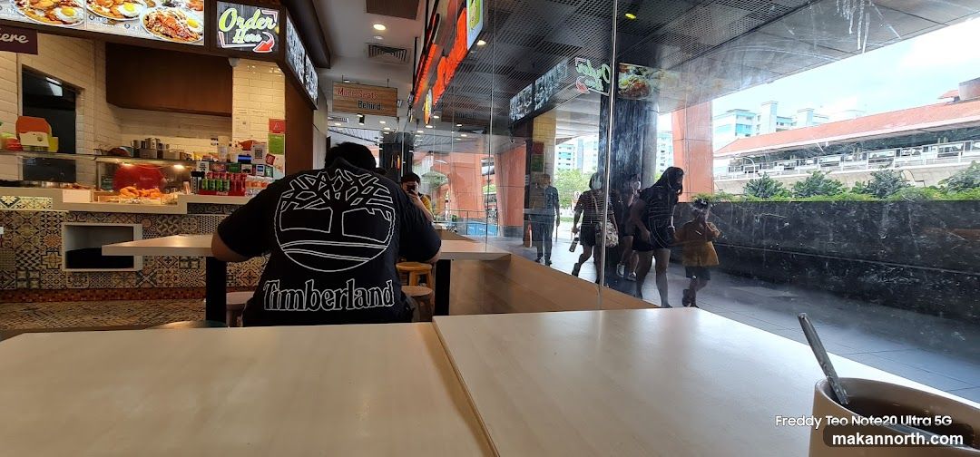 Food court interior with diners