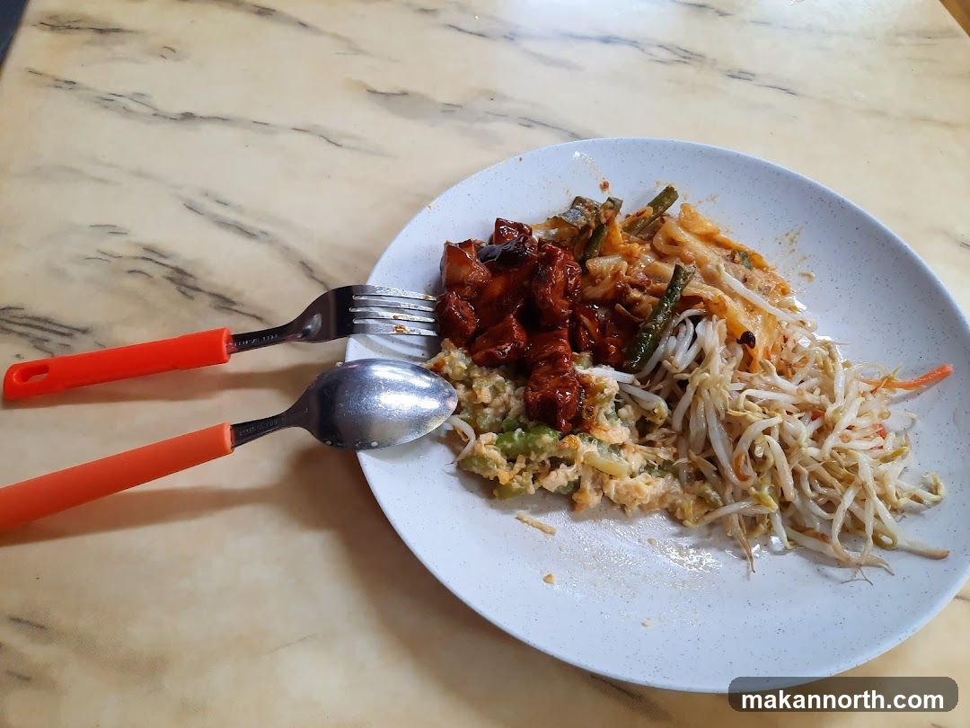 Plate of food with cutlery