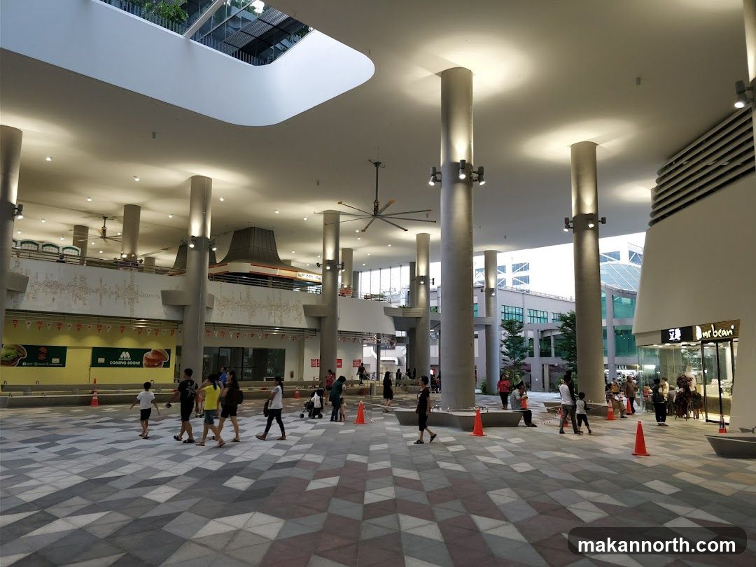 Modern Indoor Plaza with Shoppers