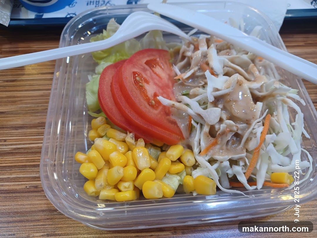 Salad in a plastic container