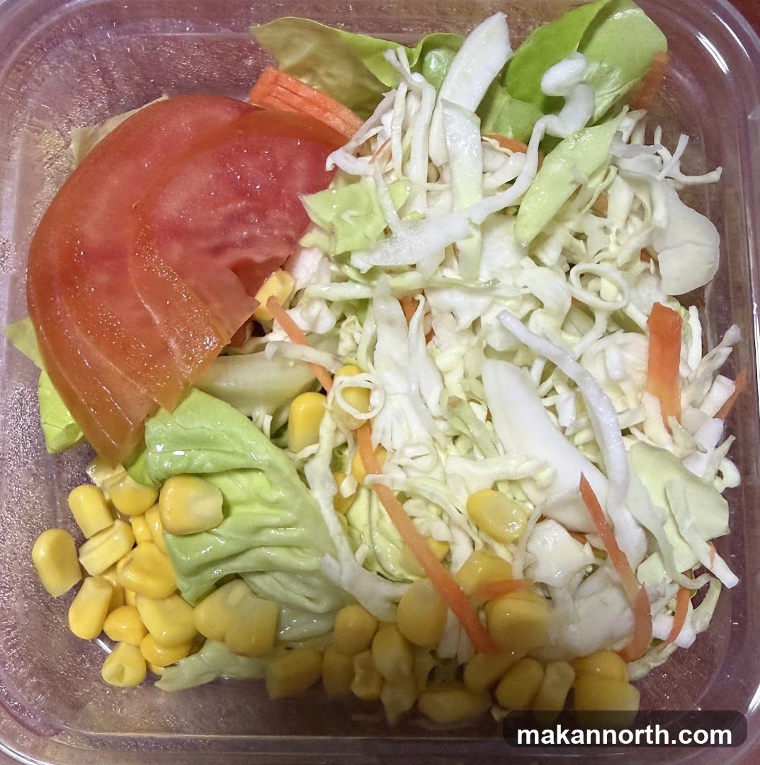 Salad in a plastic container