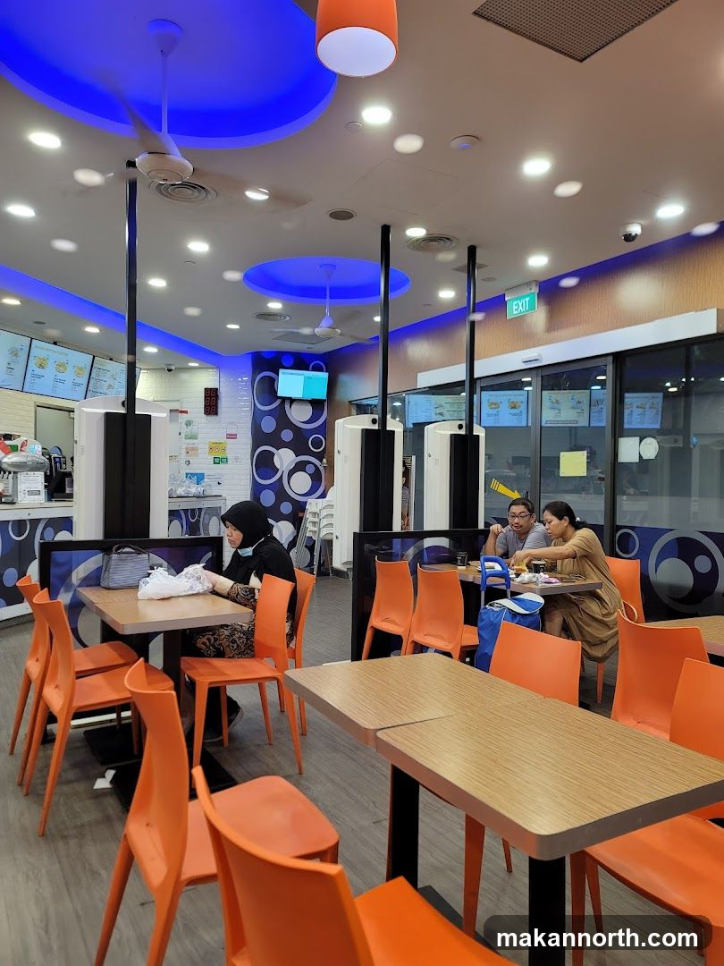 Diners in a brightly lit restaurant