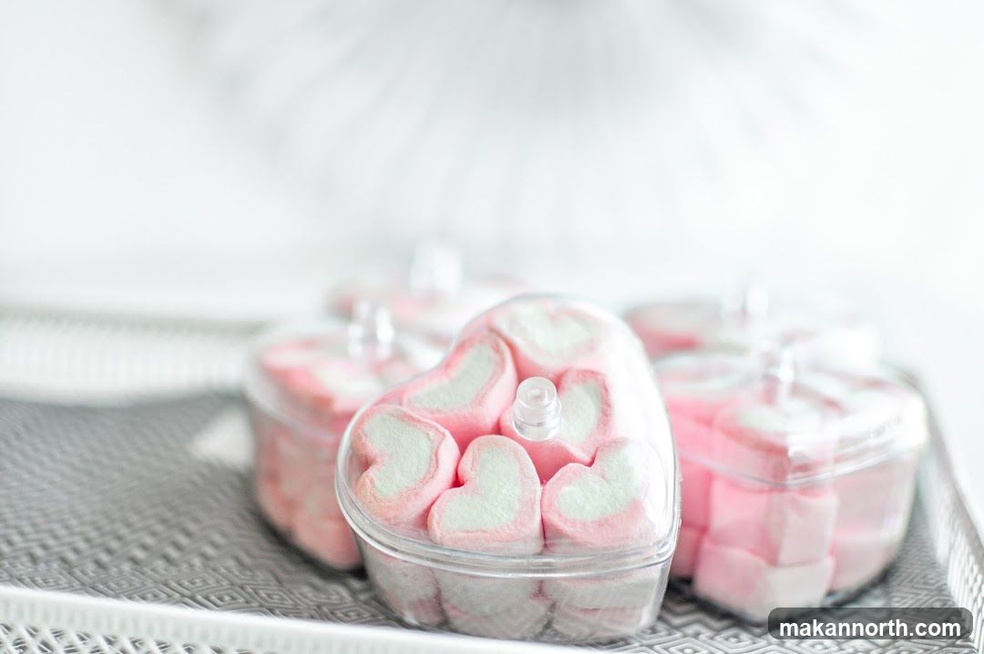 Heart-shaped marshmallows in clear containers